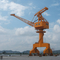 Κινητός λιμενικός πύλη γερανός κατασκευαστών της Κίνας που χρησιμοποιείται στο λιμένα για την πώληση